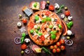 Food ingredients and spices for cooking delicious italian pizza. Mushrooms, tomatoes, cheese, onion, oil, pepper, salt Royalty Free Stock Photo