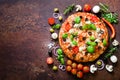 Food ingredients and spices for cooking delicious italian pizza. Mushrooms, tomatoes, cheese, onion, oil, pepper, salt Royalty Free Stock Photo