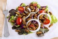 Food Insects: Fried worm insect or Chrysalis silkworm for eating as food items in salad vegetable on wood background, it is good