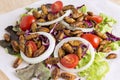 Food Insects: Silkworm Pupae insect for eating as food fried items on salad vegetable on wood background. Chrysalis Silkworm is