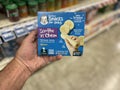 Food lion grocery store interior products hand holding Gerber baby food