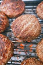 Food meat - beef burgers on bbq barbecue grill with flame Royalty Free Stock Photo