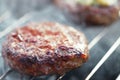 Food meat - burgers on bbq barbecue grill Royalty Free Stock Photo