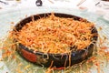 The food mess on table resulting from tossing and mixing yusheng during Chinese New Year meal is believed to bring luck