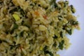 Food with a mix of rice, spinach, brinjal gravy which is popular food offered to god during festivals in India