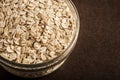 Food. Oatmeal on the table. Dry rolled oat flakes oatmeal Royalty Free Stock Photo