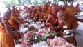 Food offerings to a monk