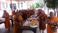 Food offerings to a monk