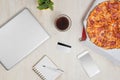 Food order pizza online internet concept on desk Royalty Free Stock Photo