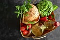 Food in a paper bag. Food donation or food delivery concept. . Free space for text. Oil, bread, cabbage, salad Royalty Free Stock Photo