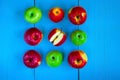 Food-pattern, apples on a blue wooden background