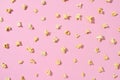 Food pattern from delicious popcorn on a light pink background. Royalty Free Stock Photo