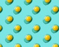 Pattern with yolks on blue background