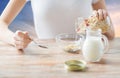 Close up of woman eating muesli for breakfast Royalty Free Stock Photo