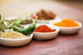 Food, pepper and spices on table for cooking gourmet meal, turmeric seasoning or paprika flavor. Chili vegetables Royalty Free Stock Photo