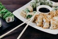 Sushi rolls with salmon, tuna and avocado Royalty Free Stock Photo