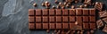 Empty Chocolate Frame on Dark Table - Milk Chocolate Blocks and Pieces - Food Photography Background Royalty Free Stock Photo