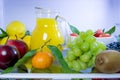 Food photography of a clean fridge filled with vegan foods such as fruits vegetables, juices and plant milk Royalty Free Stock Photo