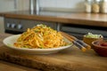 Food photography of an Italian Chinese fusion dish of mie noodles with bamboo pesto Royalty Free Stock Photo