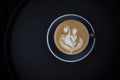 Coffee latte in grey cup with dark background Royalty Free Stock Photo