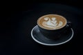 Coffee latte in grey cup with dark background Royalty Free Stock Photo