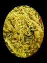 Food photography, noodles with vegetables in a bowl isolated from black background vignettes, healthy and tasty eating