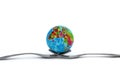 On two forks lies a mock-up of the earth on a white isolated background. Royalty Free Stock Photo