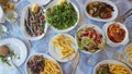 Food plates on a table top view greek food on summer greece