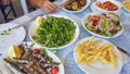 Food plates on a table top view greek food on summer greece