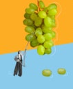 Food pop art photography. Contemporary art collage. Creative design of young woman picking grapes with vacuum cleaner.