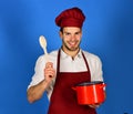 Food preparation concept. Cook works in kitchen. Royalty Free Stock Photo