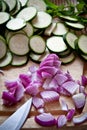 Food preparation: courgettes and onions Royalty Free Stock Photo