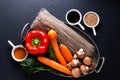 Food preparation Ingredients of Japchae korean potato noodles on black background Royalty Free Stock Photo