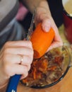 Food preparation. scour red carrot for vegetarian table