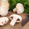 Food preparation: Sliced mushrooms on a chopping board Royalty Free Stock Photo