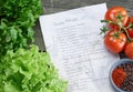 Food recipe paper on wooden table