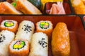 Food replicas of rolled cooked vinegary rice and sushi in Bento
