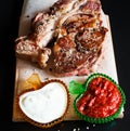 Food. ribeye steak, sauce Royalty Free Stock Photo