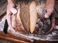 Food. rye bread in male hands Royalty Free Stock Photo