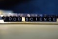 FOOD SCIENCE concept wooden blocks on the table. Royalty Free Stock Photo