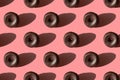 Food seamless pattern of tasty chocolate glazed donuts with a shadows on a pink background Royalty Free Stock Photo