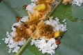 food served on banana leaves, to eat together. one form of togetherness in the village. pleasant.