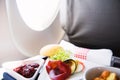 Food served on board of business class airplane on the table Royalty Free Stock Photo