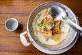 Food set of breakfast pan-fried egg with toppings sausage and vegetables on small pan at local restaurant cafe shop for thai Royalty Free Stock Photo