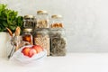 Food set. Raw cereals, pasta, groats, organic legumes and useful seeds in glass jars. Royalty Free Stock Photo