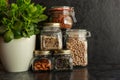 Food set. Raw cereals, pasta, groats, organic legumes and useful seeds in glass jars. Royalty Free Stock Photo