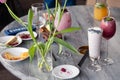 Food shooting. Berry cocktail in crystal glass decorated mint, berries, pomegranate, orange, pineapple. Concept summer drinks, Royalty Free Stock Photo