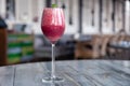 Food shooting. Berry cocktail in crystal glass decorated mint, berries, pomegranate, orange, pineapple. Concept summer drinks,