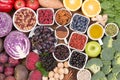 Food sources of natural antioxidants such as fruits, vegetables, nuts and cocoa powder Royalty Free Stock Photo