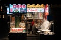 Food stall operating at night